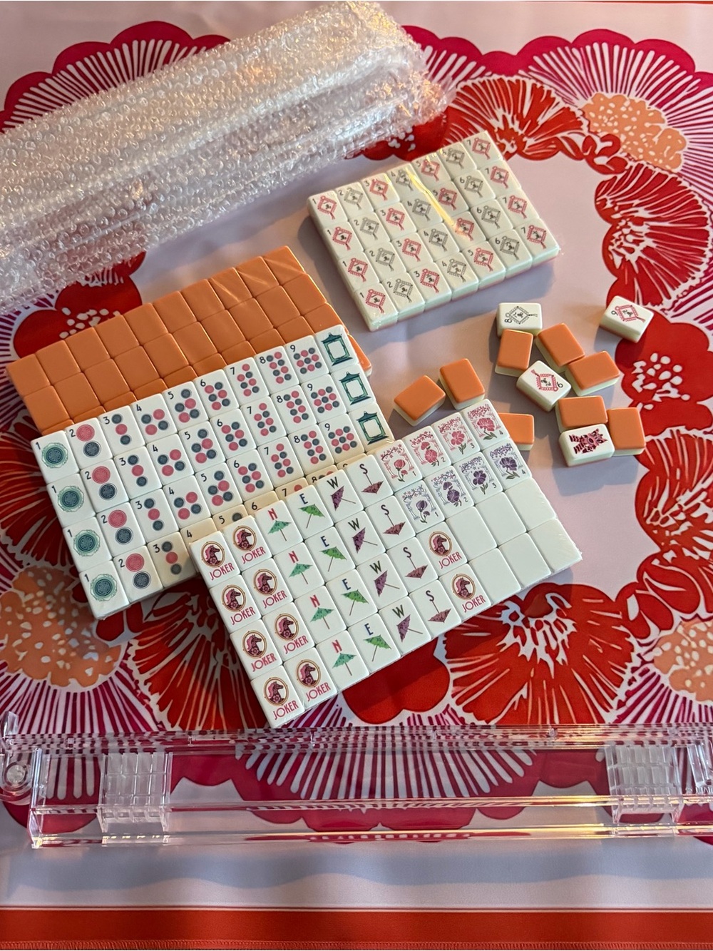 Classic Mahjong Tile Set - Orange, pink, and red with tiles, racks and mat